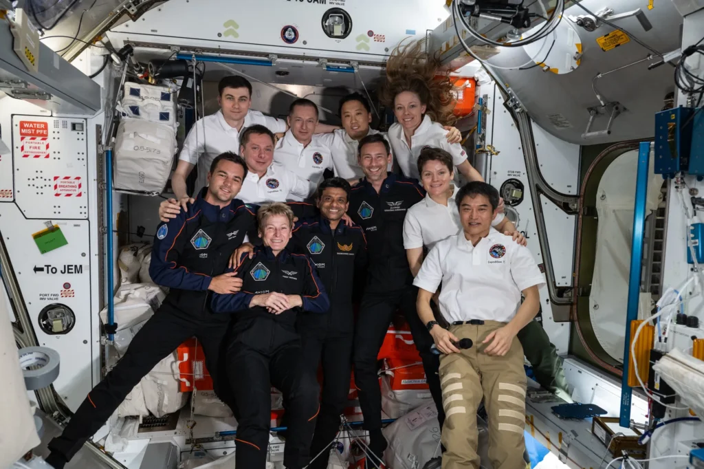 the axiom mission 4 and expedition 73 crews take a group portrait